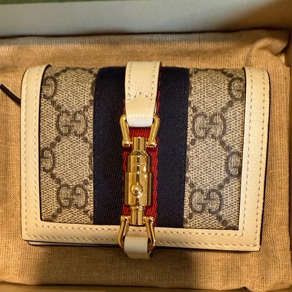 Gucci Beige and Black Wallet with Gold Accents